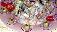 Salată de scrumbii sărate cu ceapă